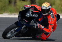 Chris Carr on motorcycle in competition