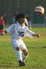 Boy playing soccer