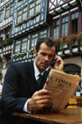 Businessman reading paper