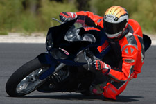 Chris Carr on motorcycle in competition